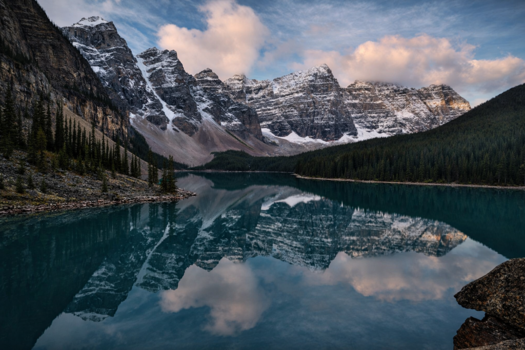 Moraine Lake with turquoise water reflecting the Ten Peaks in Banff National Park at sunrise