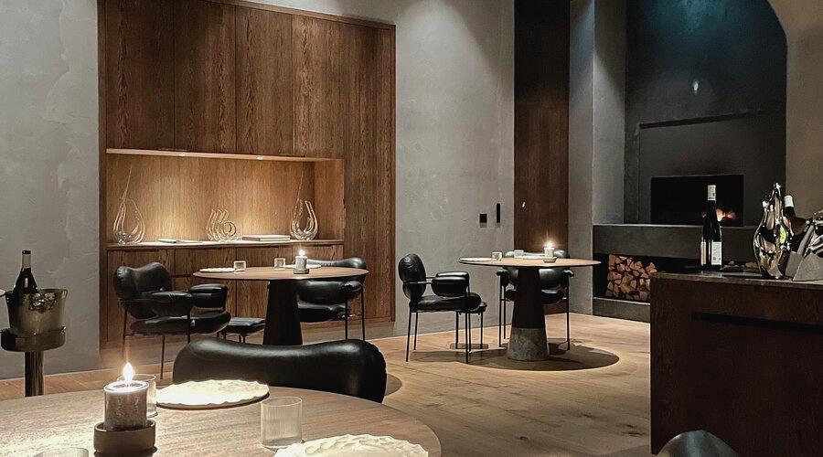 Oslo luxury travel dining scene at a Michelin-starred restaurant with modern Nordic design